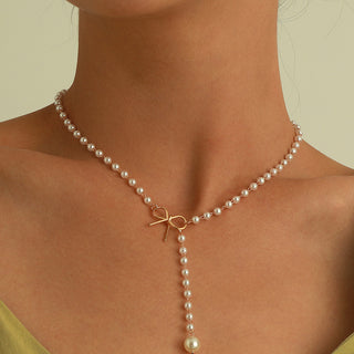 Gold Bowknot Pearl Pendant Necklace